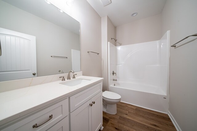 821 Lichfield Rd, Columbus, GA 31904 - full bath with vanity, wood finished floors, and bathing tub / shower combination