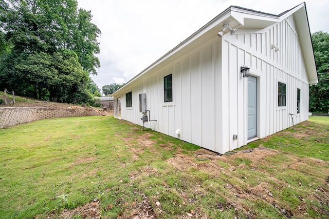 821 Lichfield Rd, Columbus, GA 31904 - view of side of property with board and batten siding and a lawn