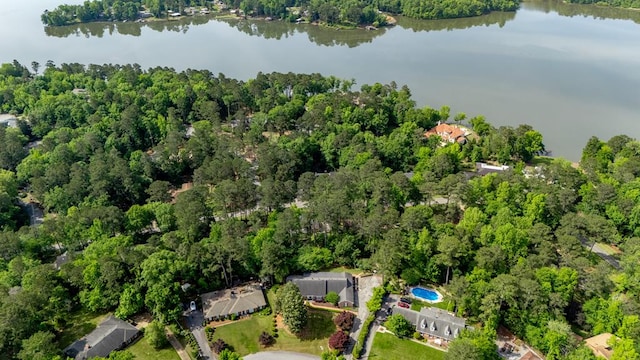 bird's eye view featuring a water view and a view of trees