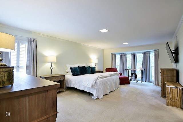 bedroom with crown molding and light carpet
