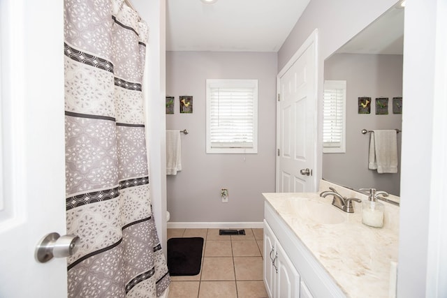 full bathroom featuring baseboards, visible vents, a shower with curtain, tile patterned floors, and vanity