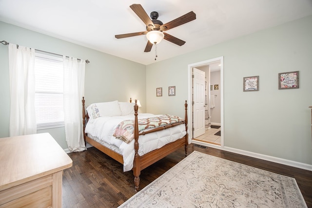 bedroom featuring dark wood-type flooring, connected bathroom, ceiling fan, and baseboards