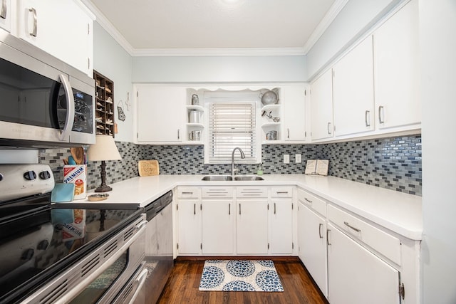 kitchen featuring crown molding, open shelves, stainless steel appliances, tasteful backsplash, and a sink