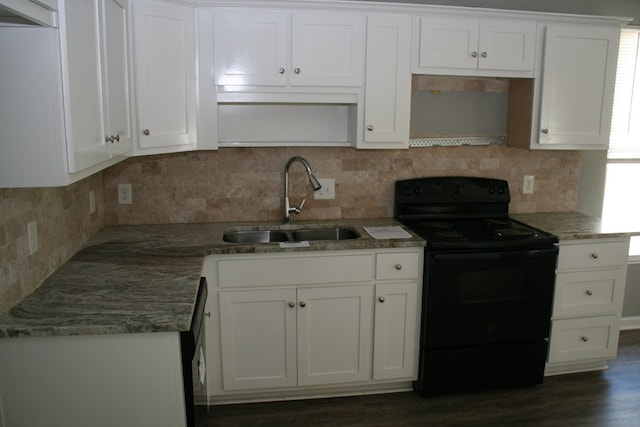 3813 Meritas Dr, Columbus, GA 31904 - kitchen featuring black electric range oven, white cabinets, backsplash, stone counters, and dark wood-type flooring