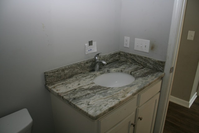 3813 Meritas Dr, Columbus, GA 31904 - bathroom featuring vanity and wood finished floors