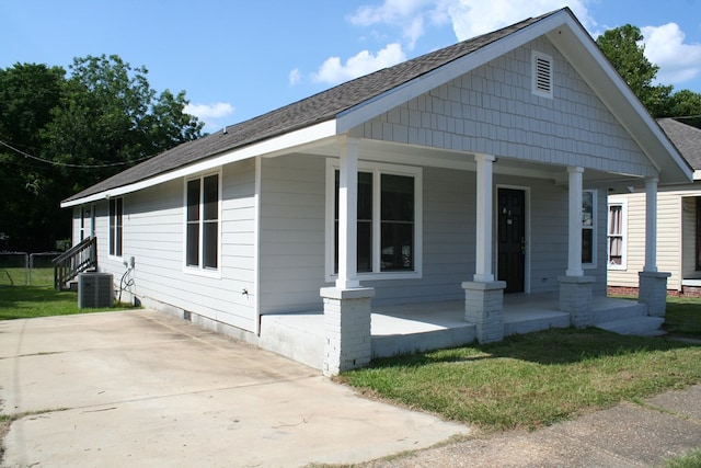 3813 Meritas Dr, Columbus, GA 31904 - bungalow-style house with covered porch, roof with shingles, a front lawn, and crawl space