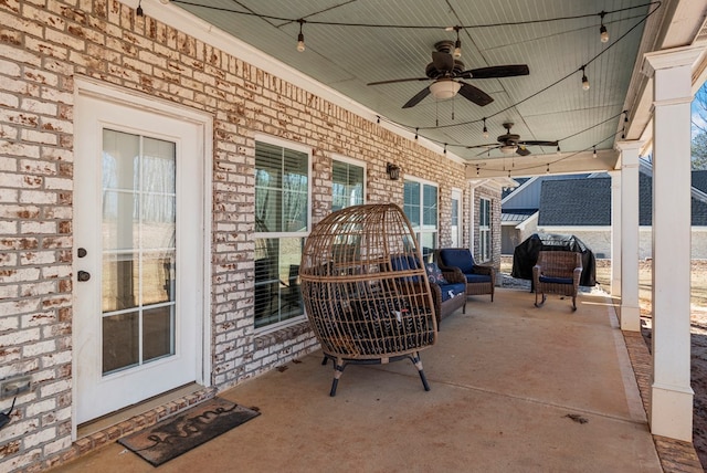 view of patio featuring covered porch and ceiling fan