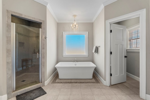 full bath with baseboards, a stall shower, a soaking tub, and crown molding