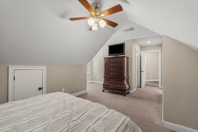 bedroom with baseboards, visible vents, a ceiling fan, vaulted ceiling, and carpet floors