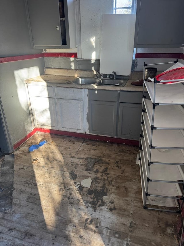 kitchen with sink and gray cabinets