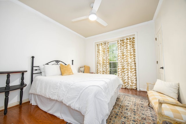 bedroom featuring dark wood-type flooring, ceiling fan, and crown molding