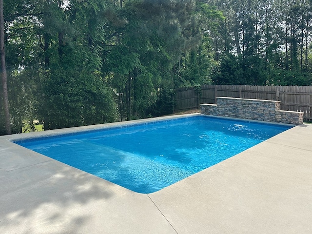 2708 Sawgrass Ln, Phenix City, AL 36867 - view of swimming pool featuring a fenced backyard, a fenced in pool, and a patio area
