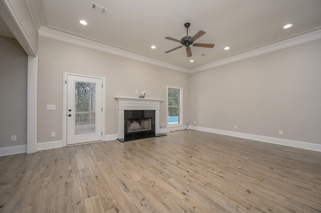 2708 Sawgrass Ln, Phenix City, AL 36867 - unfurnished living room with crown molding, a ceiling fan, visible vents, and wood finished floors