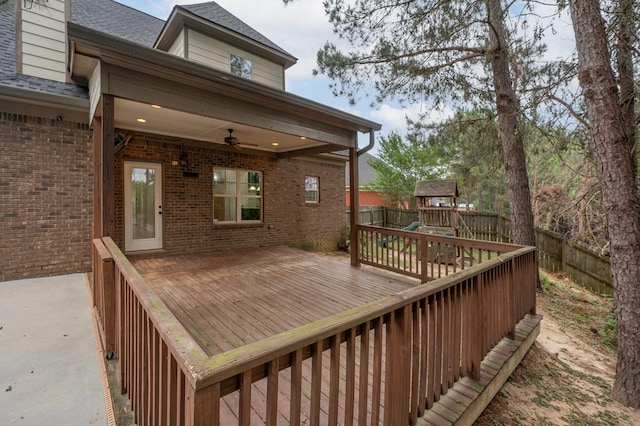 2708 Sawgrass Ln, Phenix City, AL 36867 - deck featuring a playground, ceiling fan, and a fenced backyard
