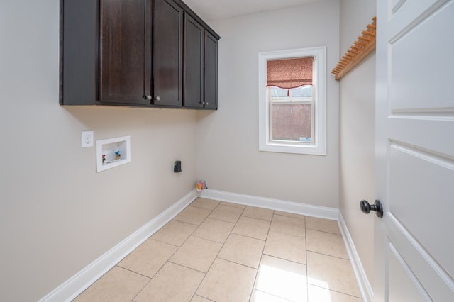 2708 Sawgrass Ln, Phenix City, AL 36867 - washroom with cabinet space, washer hookup, baseboards, light tile patterned floors, and hookup for an electric dryer