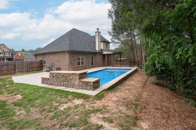 2708 Sawgrass Ln, Phenix City, AL 36867 - view of pool featuring fence, a wooden deck, a patio area, and a fenced in pool