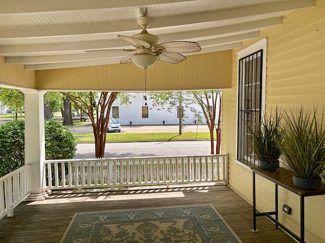 exterior space featuring ceiling fan and covered porch