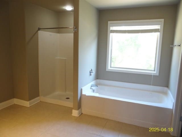 8 Rusty Dr, Phenix City, AL 36869 - full bath featuring tile patterned floors, a bath, a shower, and baseboards