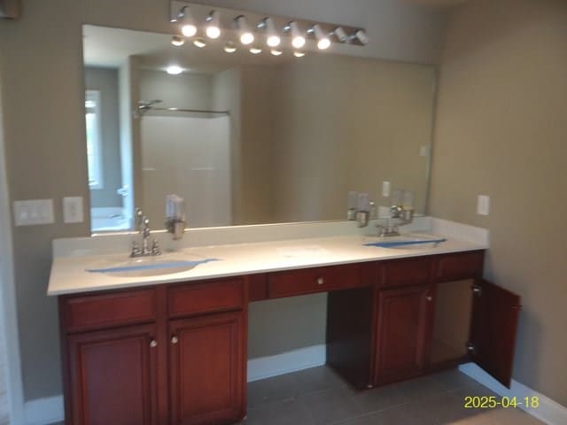 8 Rusty Dr, Phenix City, AL 36869 - full bath with double vanity, a sink, and tile patterned floors