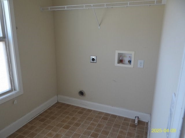 8 Rusty Dr, Phenix City, AL 36869 - laundry room with electric dryer hookup, baseboards, washer hookup, and laundry area