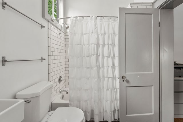 1580 Dixon Dr, Columbus, GA 31906 - full bathroom featuring toilet and shower / bathtub combination with curtain
