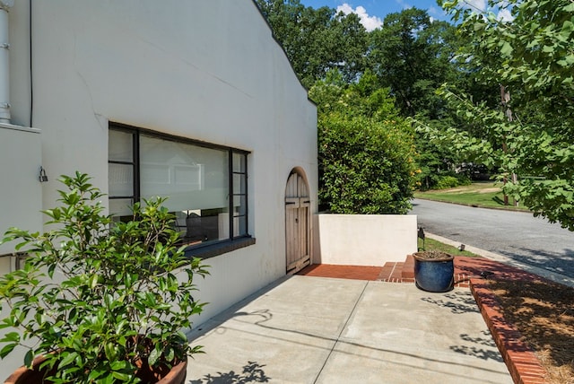 1580 Dixon Dr, Columbus, GA 31906 - view of side of home featuring stucco siding