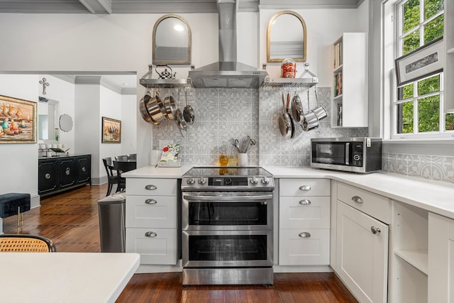 1580 Dixon Dr, Columbus, GA 31906 - kitchen featuring appliances with stainless steel finishes, extractor fan, ornamental molding, light countertops, and tasteful backsplash