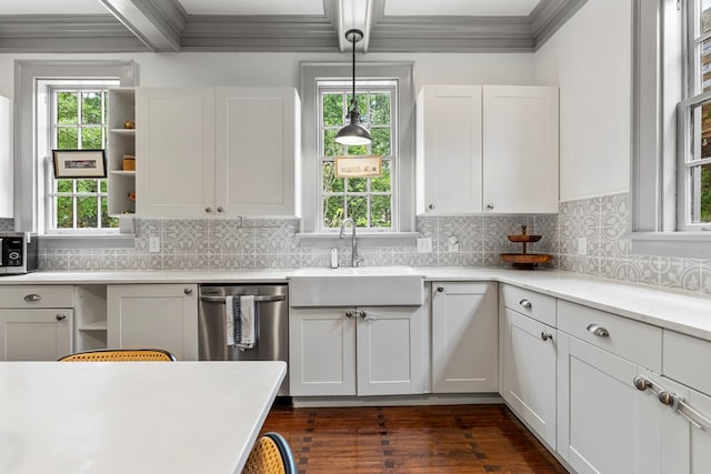 1580 Dixon Dr, Columbus, GA 31906 - kitchen featuring appliances with stainless steel finishes, dark wood finished floors, light countertops, backsplash, and crown molding