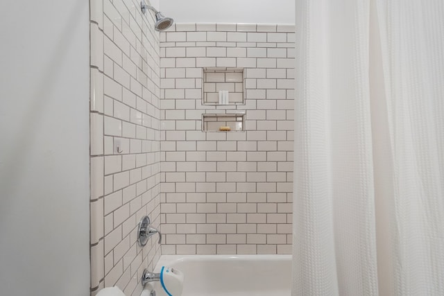 1580 Dixon Dr, Columbus, GA 31906 - bathroom featuring shower / bath combo with shower curtain