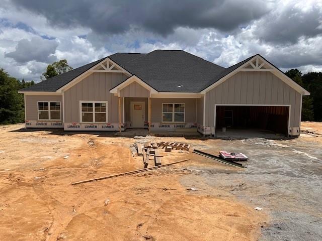 271 Lee Road 0169, Opelika, AL 36804 - property under construction featuring board and batten siding, an attached garage, and a porch