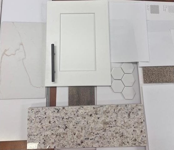271 Lee Road 0169, Opelika, AL 36804 - detailed view of white cabinets, light stone countertops, and backsplash