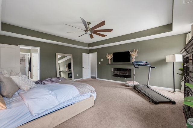 221 Abberly Ln, Ellerslie, GA 31807 - bedroom with carpet, a tray ceiling, and ceiling fan