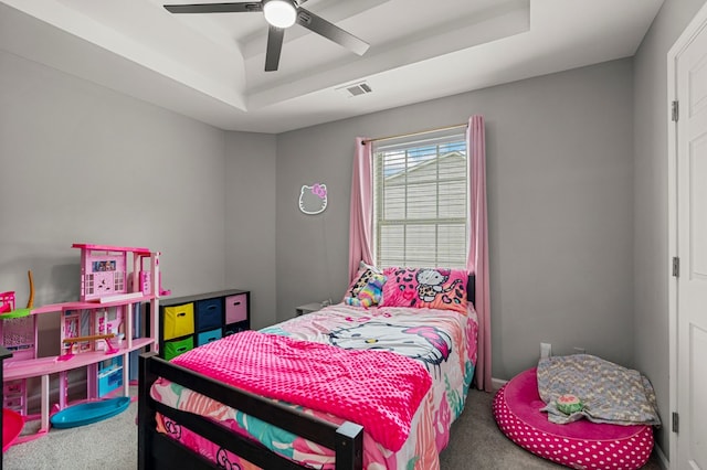 917 Dawkins Ct, Phenix City, AL 36867 - bedroom featuring carpet floors, a tray ceiling, and ceiling fan