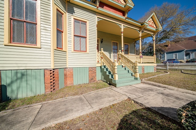 entrance to property with a porch