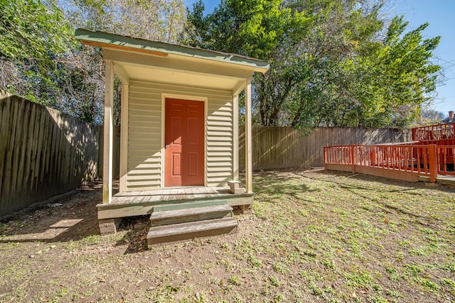 view of outdoor structure with a lawn