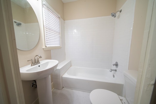 full bathroom featuring tile patterned floors, toilet, sink, and shower / bathing tub combination