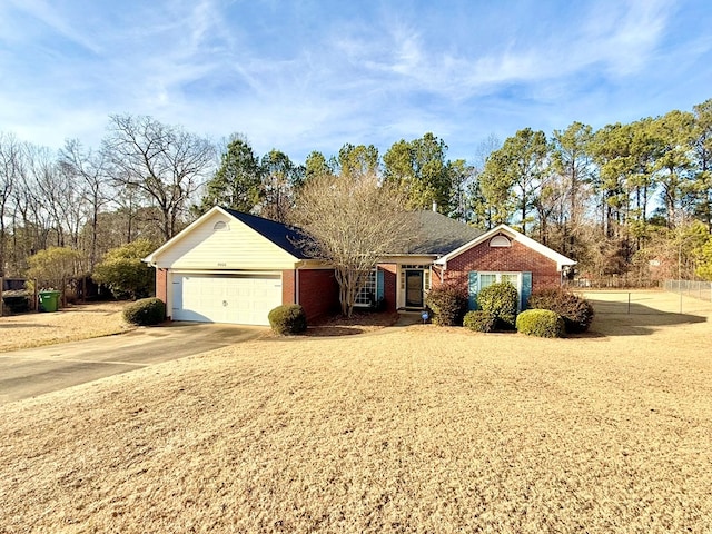 single story home featuring a garage