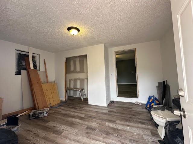 3019 50th St, Valley, AL 36854 - interior space with wood finished floors and a textured ceiling