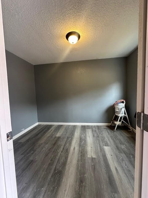 3019 50th St, Valley, AL 36854 - spare room featuring a textured ceiling and wood finished floors