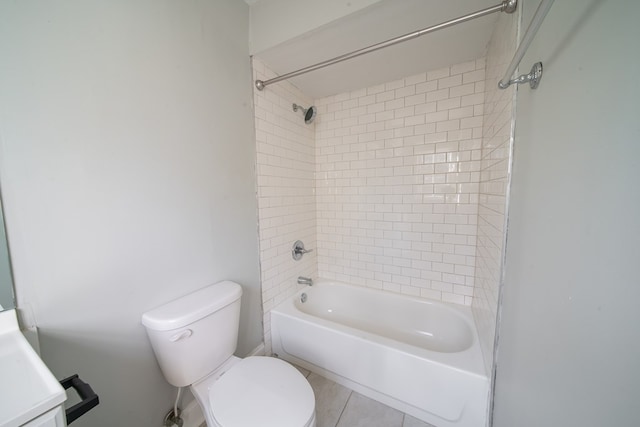 bathroom with tiled shower / bath combo, tile patterned flooring, and toilet