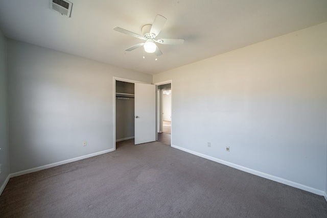 unfurnished bedroom with a closet, ceiling fan, and carpet