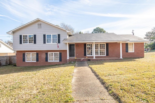 tri-level home featuring a front yard