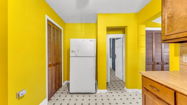 kitchen with white fridge