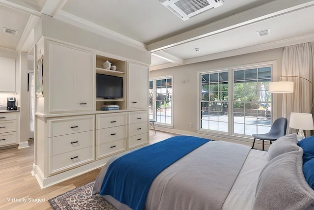 bedroom with light wood-style floors, visible vents, and crown molding