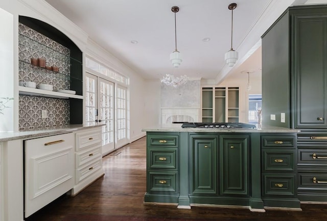 kitchen featuring stainless steel gas cooktop, white cabinets, green cabinets, open shelves, and decorative light fixtures