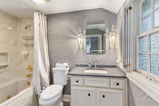 full bath featuring shower / bath combination with curtain, vanity, toilet, and wallpapered walls