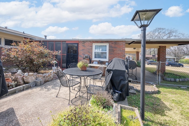 view of patio / terrace featuring fence