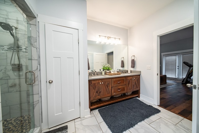 11602 Ga Highway 0085, Waverly Hall, GA 31831 - full bathroom featuring marble look tiles, a stall shower, double vanity, and baseboards