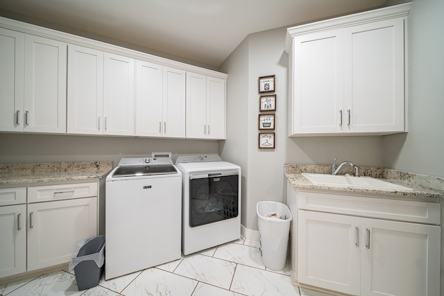 11602 Ga Highway 0085, Waverly Hall, GA 31831 - laundry area with cabinet space, washing machine and dryer, and light marble finish flooring