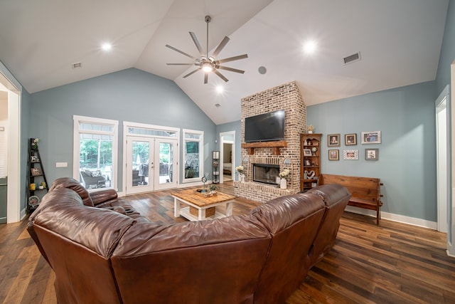 11602 Ga Highway 0085, Waverly Hall, GA 31831 - living area featuring ceiling fan, dark wood-type flooring, french doors, high vaulted ceiling, and a fireplace